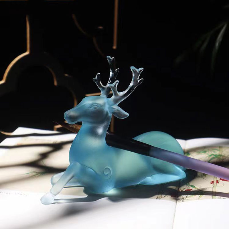 Support de brosse en forme de cerf en verre bleu
